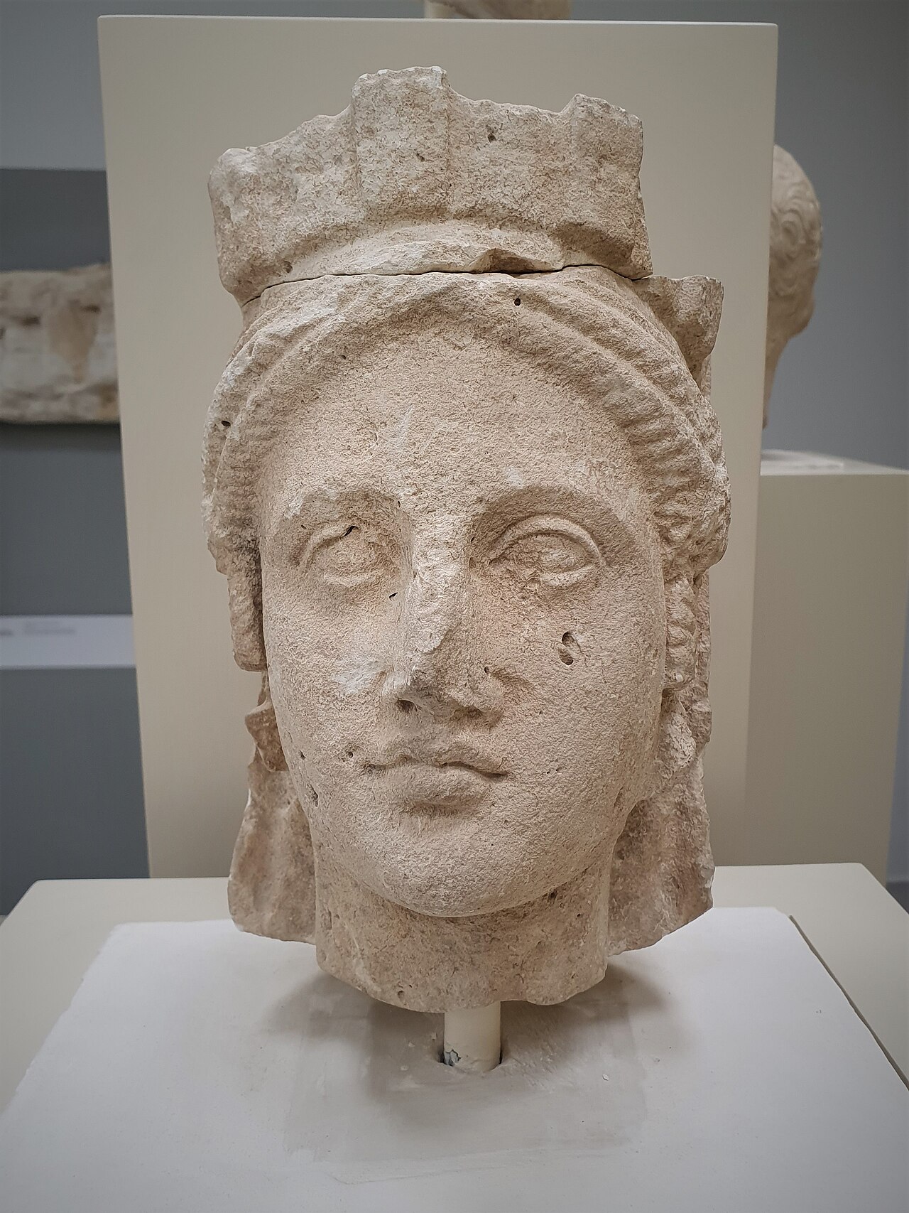 Limestone female head with a crown from Arsos, photographed in Larnaca District Archaeological Museum